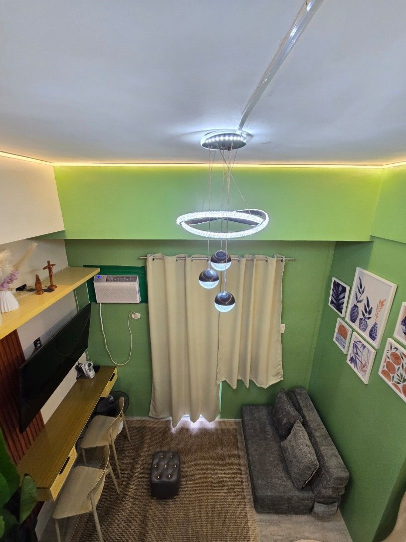 Grey pull out sofa bed with cushions (Category: Apartments & Condos) located in Pasig City. Submitted by condoforrent2026 (Listing ID 1465933269, Image 2). Description: Fully furnished/complete appliances Studio unit with loft type bed/room with balcony 23k/month (inclusions: wifi, assoc. Dues) 1+1 Location: Avenida Manila Very near to lrt doroteo jose/lrt recto Near to universities (Feu,Ue,Ceu, San Beda,etc), Review centers, etc. 👫 Ideal for 2 