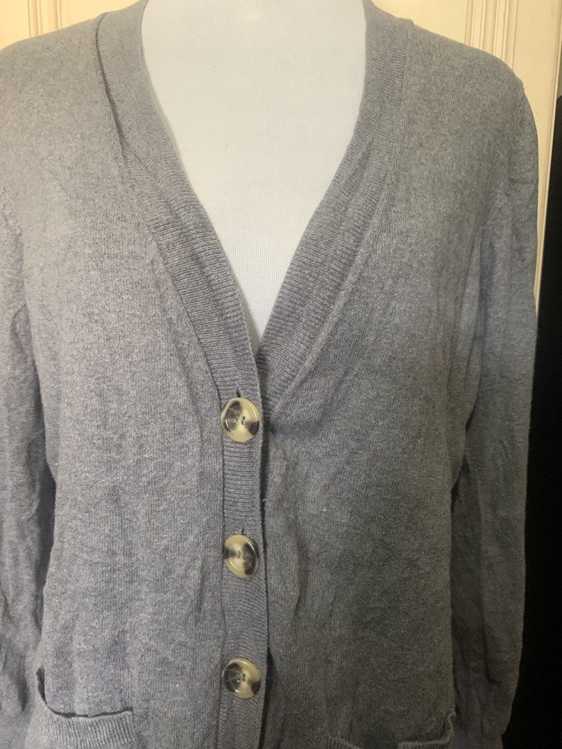 Grey V-Neck Button-Up Cardigan with Pockets (Category: Coats, Jackets and Outerwear) located in Quezon City. Submitted by clothingline4sale (Listing ID 1465898688, Image 3). Description: Gray Button Down Cardigan Very good condition/ like new Cut tag / Long Cardigan with pockets / Soft Fabric/ not itchy Size: large -xl Bust: 46-54” ; Length: 28” ; Arms Circumference: 16-20” Very nice in actual .