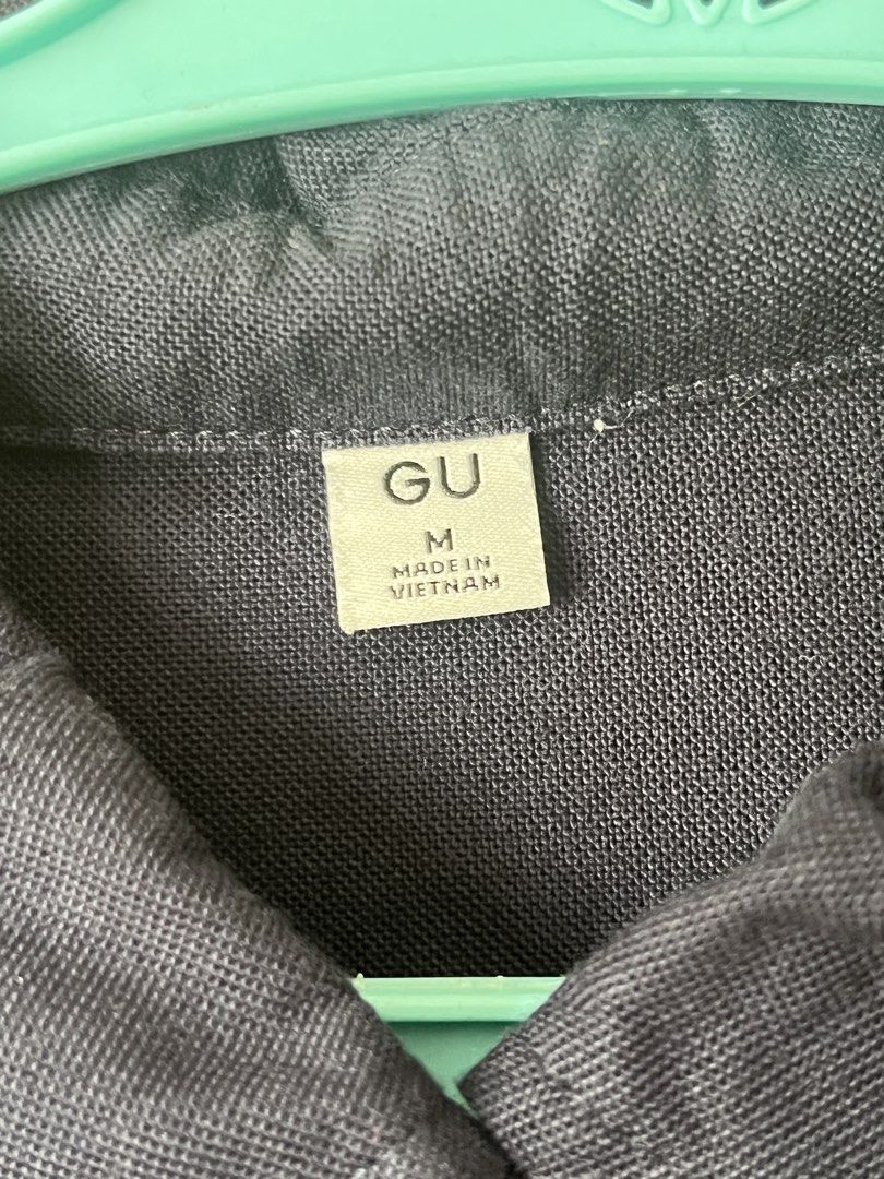 GU Navy Blue Long Sleeve Button Up Shirt (Category: Longsleeves) located in Makati City. Submitted by gworlhood (Listing ID 1465822742, Image 2). Description: - Brand: GU - Color: Dark blue - Size: M (Regular fit) - Material: 100% cotton - Features: Pointed collar, front button placket, single chest pocket, long sleeves with buttoned cuffs - Condition: Excellent, used only once; interior brand label and care tag intact - Style: Versatile and easy