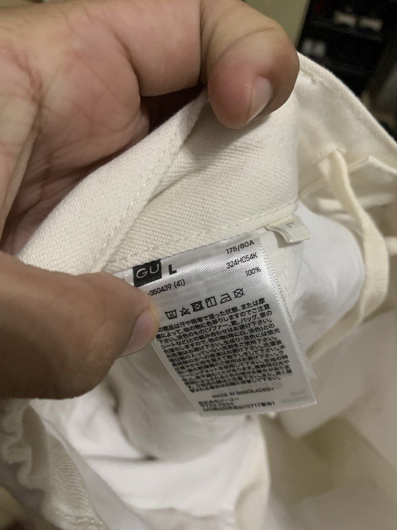 GU White Wide Leg Pants Size L (Category: Trousers) located in Manila. Submitted by thrifty111 (Listing ID 1465924554, Image 3). Description: - Brand: GU - Color: Clean White - Size: L - Material: 100% fabric (Made in Bangladesh) - Waist: Button closure with comfortable elastic band - Fit: Relaxed, wide-leg style - Style: Versatile and perfect for casual daily wear.