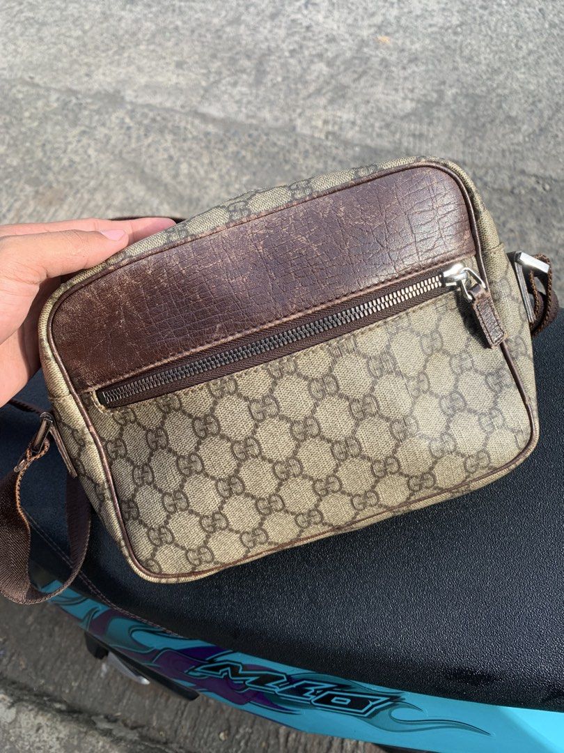 Gucci GG Supreme Sling Bag (Category: Sling Bags) located in Gingoog City. Submitted by pureshark-307a (Listing ID 1465841494, Image 2). Description: - Authentic Gucci messenger bag in signature GG Supreme canvas - Premium brown leather trim and durable zip closure - Adjustable brown web strap with a comfortable padded shoulder piece - Convenient zippered exterior front pocket for easy access - Compact yet spacious main compartment, ideal for dai