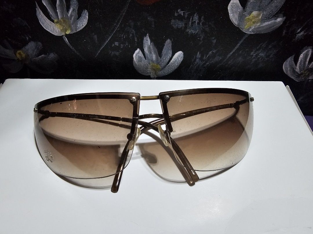 Gucci half rimless eyeglass (Category: Sunglasses & Eyewear) located in Manila. Submitted by onlinesmartshopping12 (Listing ID 1465901864, Image 2). Description: no issue except on the casing.