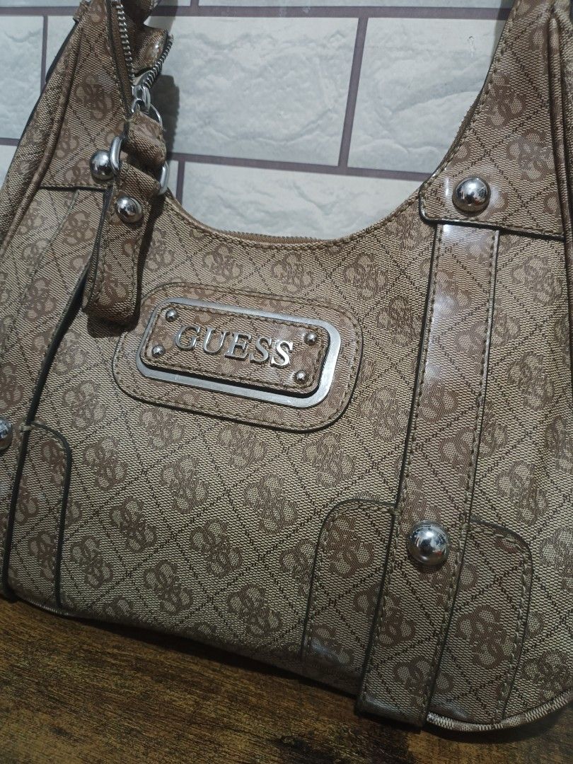 Guess (Category: Shoulder Bags) located in Las Pinas. Submitted by kuya_erick (Listing ID 1465812988, Image 3). Description: guess complete details posted 2500 + sf las pinas meet up.