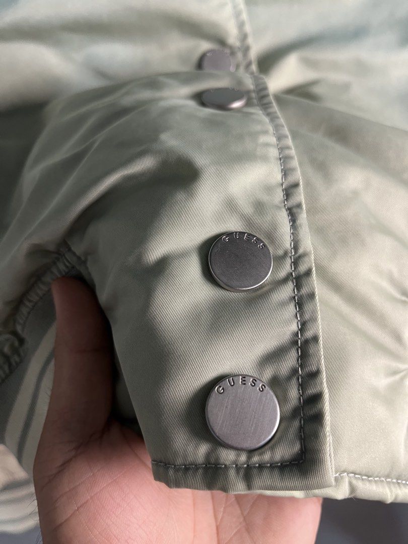 Guess jeans green bomber jacket (Category: Announcements) located in Palo. Submitted by marllennon (Listing ID 1465875924, Image 3). Description: Guess jeans green bomber Jacket Authentic no issue excellent condition color rate 10/10 W - 20.5 L - 23 Location: Palo leyte JNT EXPRESS 🚚.