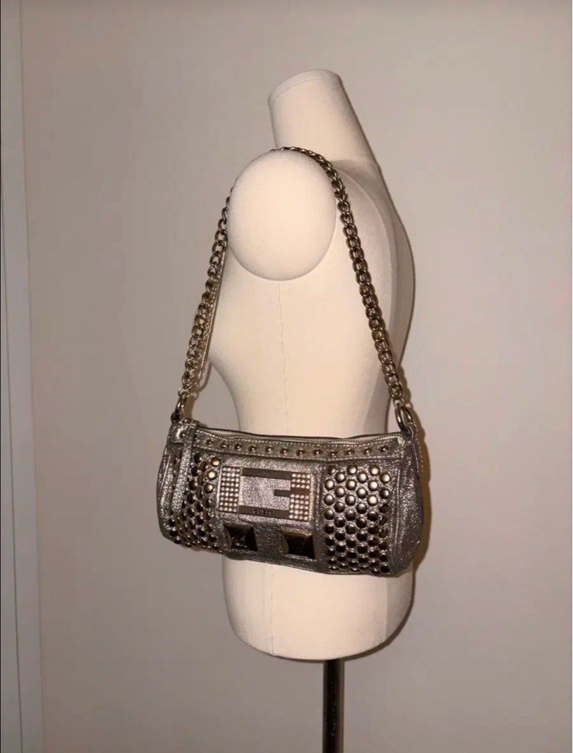 Guess metallic silver studded shoulder bag (Category: Shoulder Bags) located in Leyte. Submitted by _dearvintage (Listing ID 1465856624, Image 2). Description: ETA: 1 month Bags are from Korea & Japan Dm for more info :).