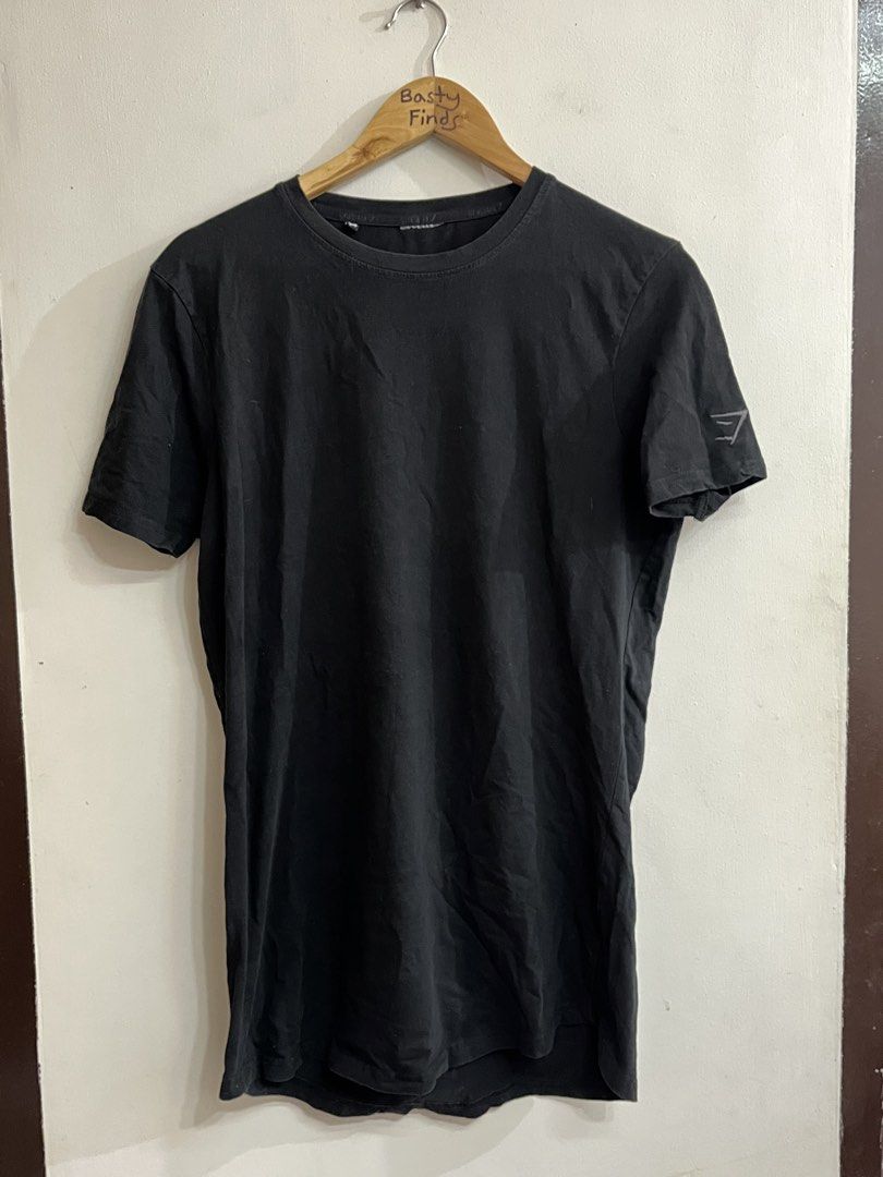 Gymshark Tee Embroided Logo (Category: Tshirts & Polo Shirts ) located in Angeles City. Submitted by bstyfinds (Listing ID 1465866434, Image 1). Description: Gymshark Tee Embroided Logo Length 29.5, Width 18.5 Very Good Condition, Cut Tags But Legit Need Wash Before Use .