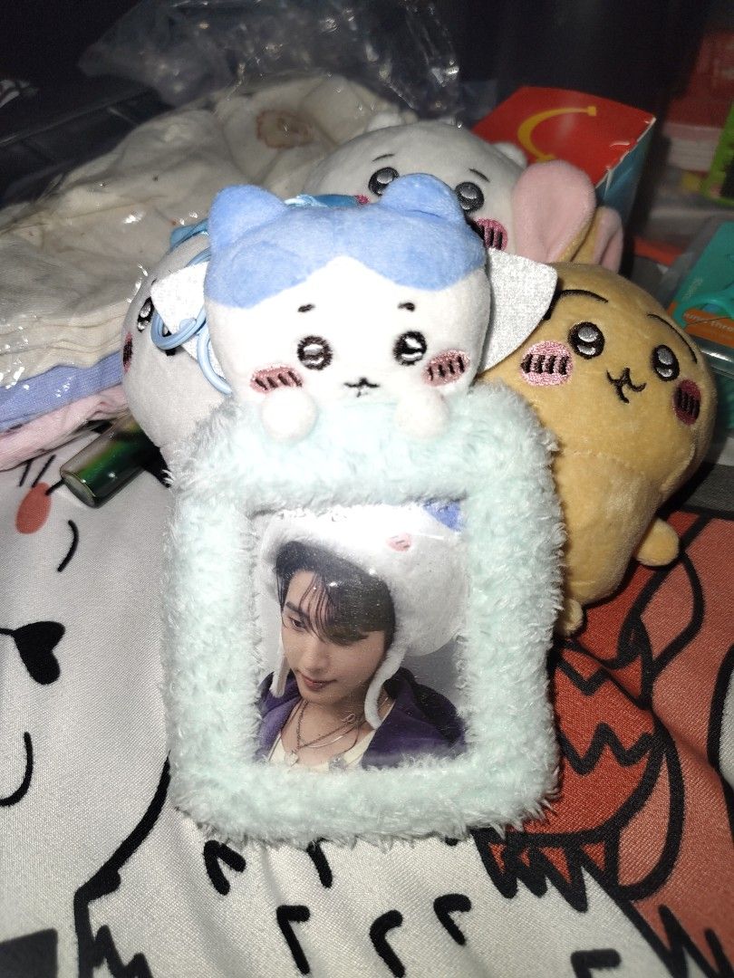 Hachiware Photocard Holder (Category: K-Wave Merchandise) located in Quezon City. Submitted by justdump_a (Listing ID 1465914389, Image 1). Description: - Color: Mint green fluffy plush material - Design: Cute blue-eared animal plush character on top - Features: Sturdy key ring attachment at the top - Use: Perfect for storing/displaying photocards or as a cute bag charm.