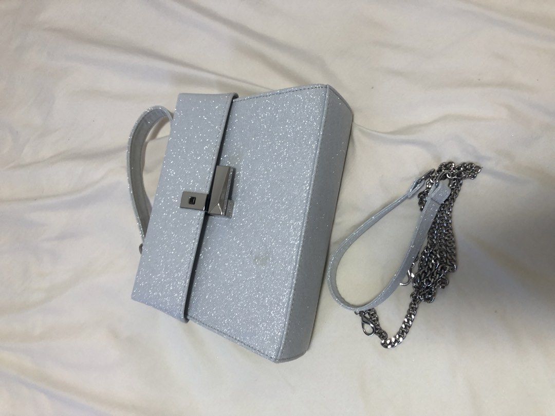 Hand &shoulder bag (Category: Shoulder Bags) located in Cabuyao City. Submitted by wakahatana (Listing ID 1465904287, Image 1). Description: M size. 1 time used. With very shiny metal hardware shoulder strap. No flaws good as new. Events and for night out or party bag. .