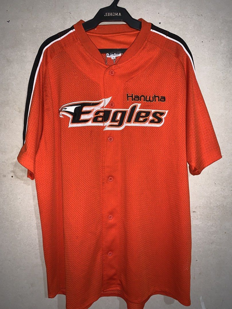 Hanwha Eagles Baseball Jersey #7 Bum Ho (Category: Activewear) located in Naga. Submitted by than09070539101 (Listing ID 1465885805, Image 1). Description: - Official licensed Hanwha Eagles jersey by Snepos - Bright orange color with stylish black and white shoulder stripes - Features player name Bum Ho and number 7 printed on the back - Button-down front design made with breathable mesh material - Tag size: 110 - Condition: Shows some minor wear