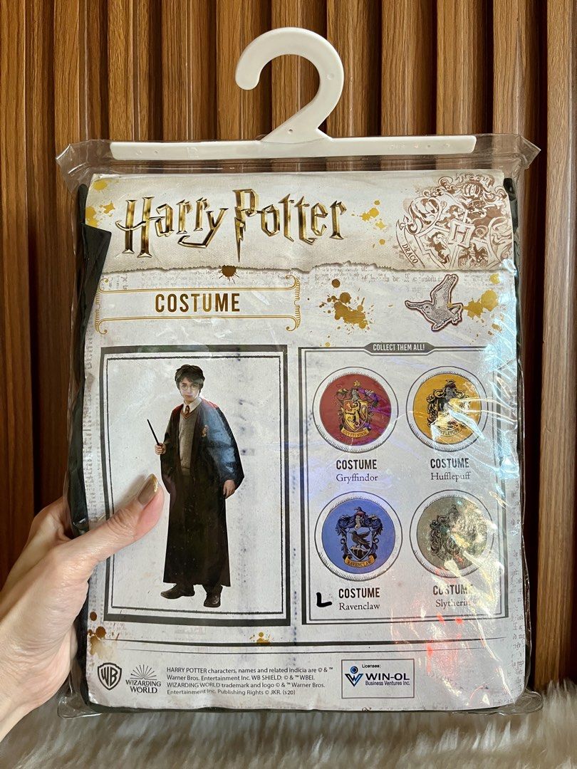 Harry Potter Ravenclaw Costume Size L (Category: Babies & Kids Fashion) located in Navotas City. Submitted by mommybabyc (Listing ID 1465879770, Image 2). Description: - Official Wizarding World Harry Potter Ravenclaw costume - Size: L - Condition: Brand new, unopened in original packaging with hanger and cardboard backing - Includes: Black robe with embroidered Ravenclaw house crest patch - Ideal for: Halloween, costume parties, and dress-up eve