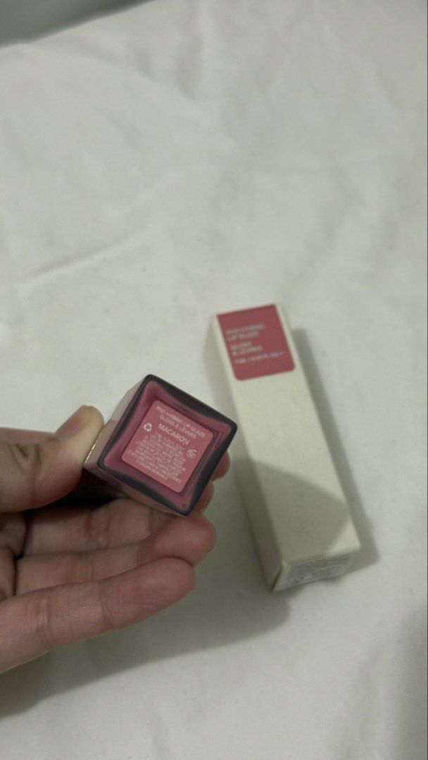 Haus Labs PhD Hybrid Lip Glaze Macaron (Category: Makeup) located in Valenzuela. Submitted by alexinelg (Listing ID 1465936449, Image 3). Description: - Brand: Haus Labs - Product: PhD Hybrid Lip Glaze - Shade: Macaron - Volume: 7 ml / 0.25 fl oz - Condition: Brand new, unopened, with original outer box - Packaging: Clean white exterior with product label details on top.