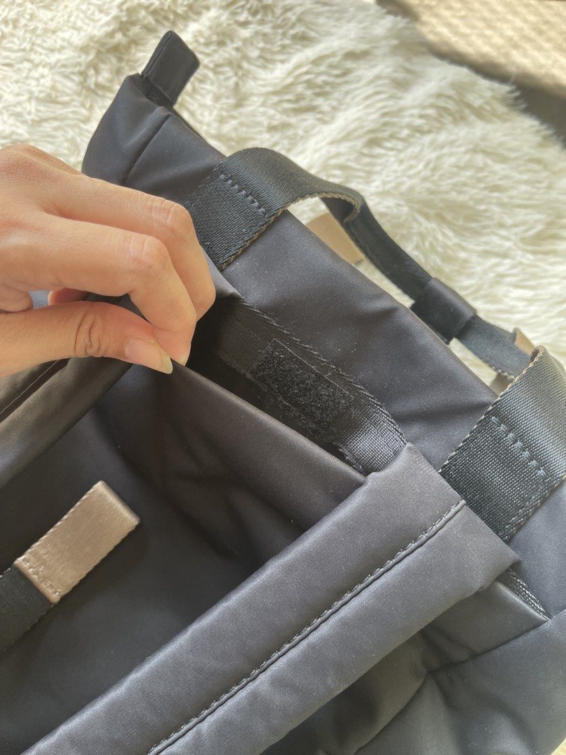 Hedgren Convertible Tote Backpack Black (Category: Backpacks) located in Malolos. Submitted by ishnnt (Listing ID 1465907154, Image 3). Description: - Authentic Hedgren black convertible bag (functions as both a backpack and tote) - Features convenient top handles and adjustable padded shoulder straps - Front zippered pocket includes a handy small keychain attachment - Neutral beige interior lining with multiple compartments and zippered pockets 
