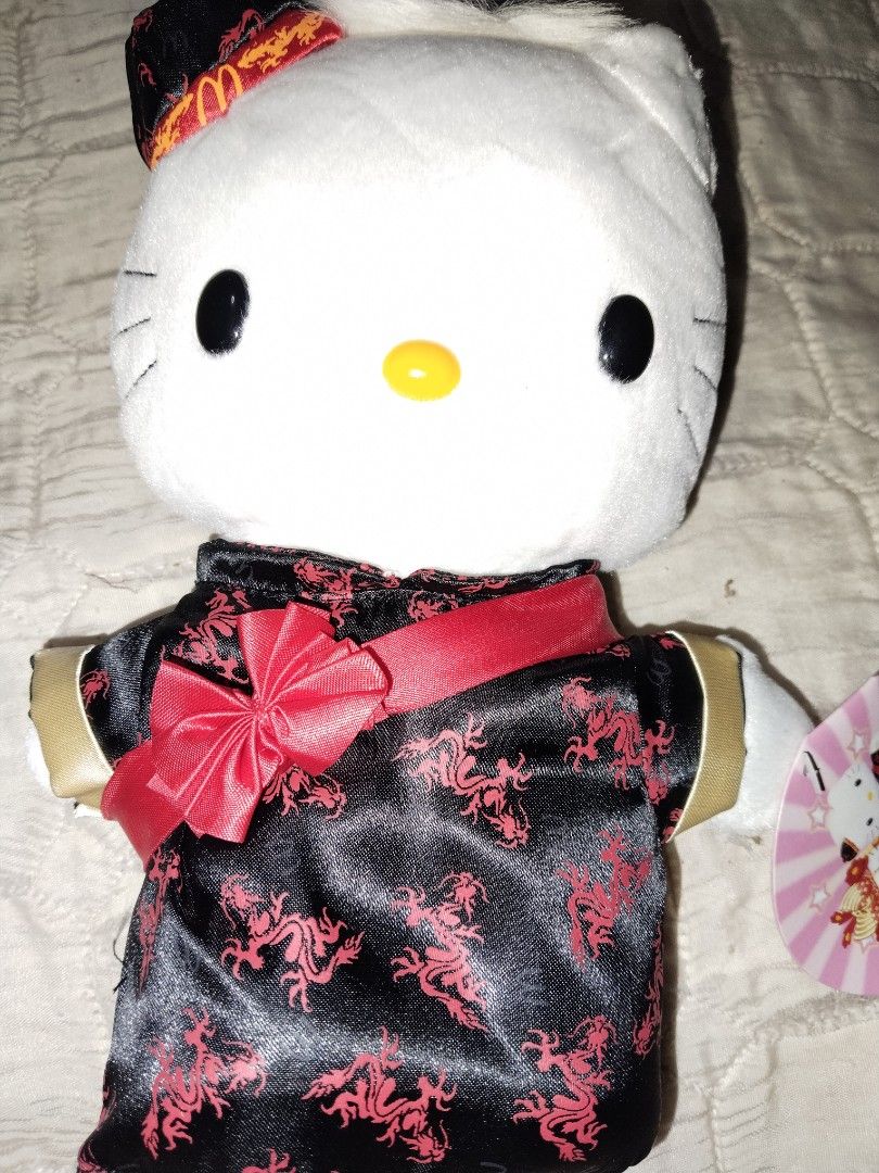 Hello Kitty McDonald's Plush Toy Collection (Category: Plushies & Soft Toys) located in Manila. Submitted by kittygalore0615 (Listing ID 1465778741, Image 2). Description: - Set of 4 McDonald's Sanrio Kitty plush toys - Includes: Astronaut Dear Daniel (with helmet), CNY Dragon Robe, Wedding Phoenix Crown, and Graduation Gown - Original pink collector hang tags still attached - Clean fabric and vibrant colors - Well-kept adult-owned collection set