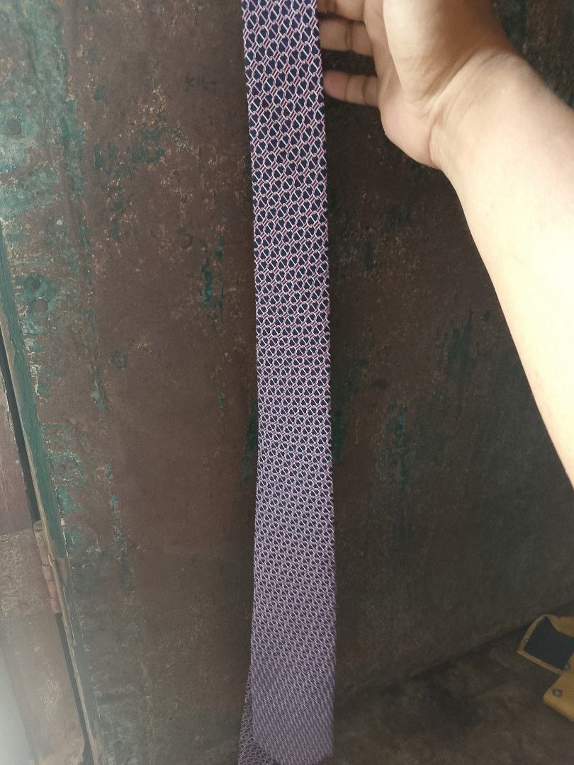 Hermès Paris Silk Tie Blue Pink Chain Link Pattern (Category: Ties) located in Caloocan City. Submitted by christian.35 (Listing ID 1465788821, Image 1). Description: - Brand: Hermès Paris (Made in France) - Material: 100% Silk - Color/Pattern: Deep blue base with pink, white, and purple chain link design - Features: Standard width, horse and carriage brand label on keeper loop and interior tail - Condition: Great, clean condition - Care: Dry cle