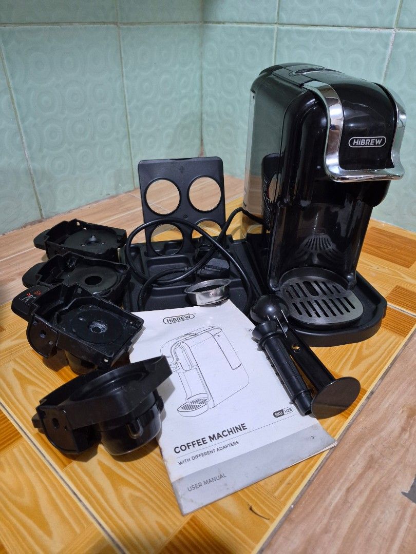HiBREW 5-in-1 Multiple Capsule Coffee Maker Machine H2B (Category: Coffee Machines & Makers) located in Antipolo. Submitted by prinsesa_dianne (Listing ID 1465940342, Image 2). Description: - Brand: HiBREW 5-in-1 Multiple Capsule Coffee Machine - Color: Sleek Black - Compatibility: Includes adapters for Nespresso, Dolce Gusto, ground coffee, ESE pods, and K-Cup systems - Inclusions: Complete with user manual and original packaging base - Perfect 