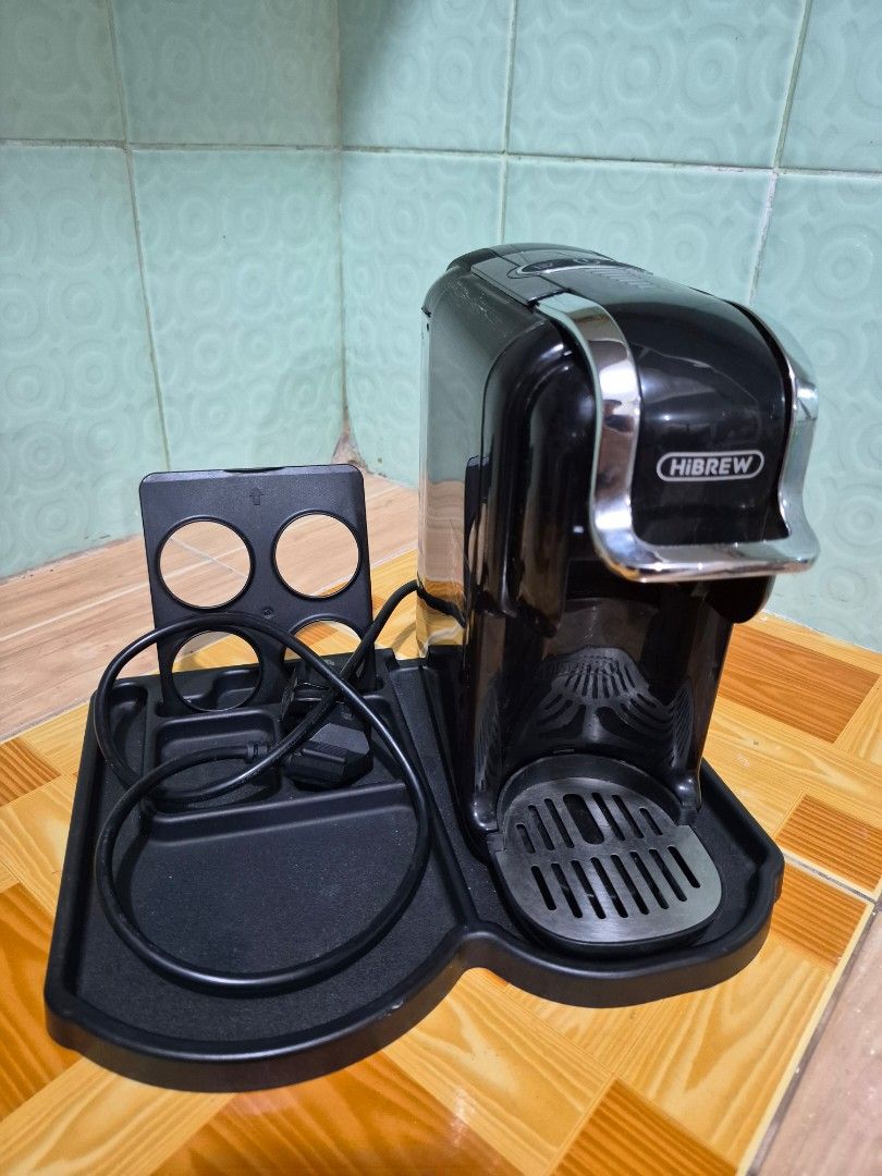 HiBREW 5-in-1 Multiple Capsule Coffee Maker Machine H2B (Category: Coffee Machines & Makers) located in Antipolo. Submitted by prinsesa_dianne (Listing ID 1465940342, Image 1). Description: - Brand: HiBREW 5-in-1 Multiple Capsule Coffee Machine - Color: Sleek Black - Compatibility: Includes adapters for Nespresso, Dolce Gusto, ground coffee, ESE pods, and K-Cup systems - Inclusions: Complete with user manual and original packaging base - Perfect 