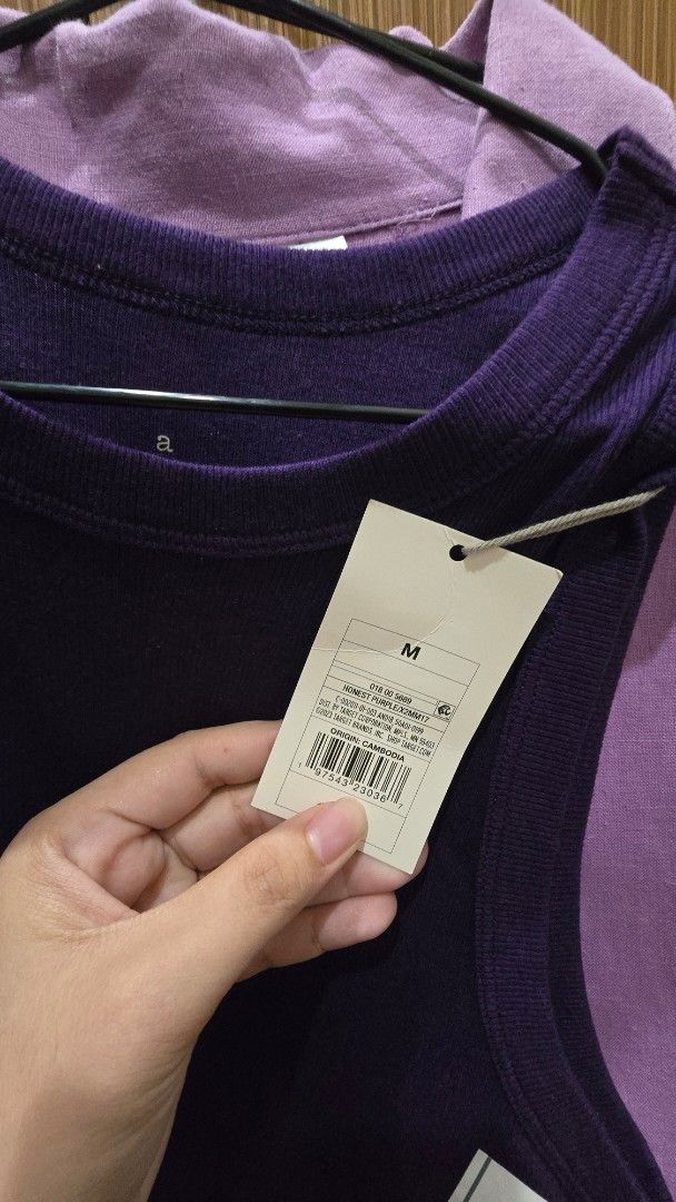 High neck tank top (Category: Sleeveless) located in Cebu City. Submitted by kitty_12345_ (Listing ID 1465878995, Image 2). Description: - Brand: A New Day - Size: Medium (M) - Color: Purple - Style: Crew neck, sleeveless, ribbed tank top - Material: Soft, stretchy cotton blend - Condition: Brand new with original tags attached - Versatility: Great basic piece for layering or wearing on its own MOP: gcash, mari, maya, gotyme MOD: Lbc, maxim Meetu