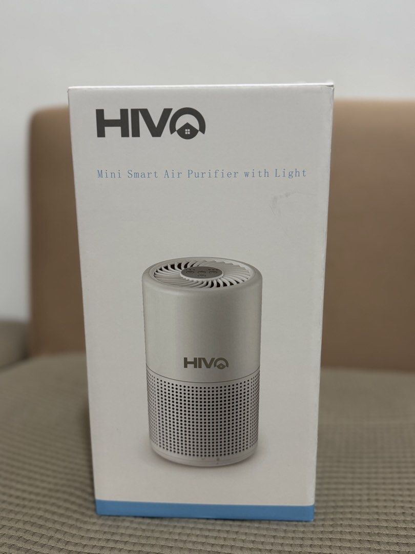 Hivo Mini Smart Air Purifier with Light (Category: Air Purifiers & Dehumidifiers) located in Manila. Submitted by kelbinooo (Listing ID 1465927568, Image 1). Description: Brand: Hivo Mini Smart Air Purifier - Color: Clean White with built-in ambient light - Design: Compact cylindrical with efficient lower-section air intake - Controls: Easy top panel for fan speed (Low, Med, High), Power, and Timer (2h, 4h, 8h) - Inclusions: Original retail box a