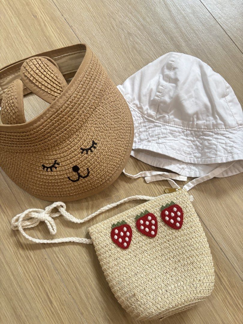 H&M baby white hat only , straw visor And strawberry bag set bundle (Category: Babies & Kids Fashion) located in Bulacan. Submitted by ricammendz (Listing ID 1465790601, Image 1). Description: Can fit til 24m - Adorable 3-piece summer accessory set for little ones (9-12M) - H&M white cotton sun hat (Size 74/80) - Straw sun visor featuring cute embroidered sleeping eyes and bunny ears - Matching straw sling bag decorated with three red strawberrie