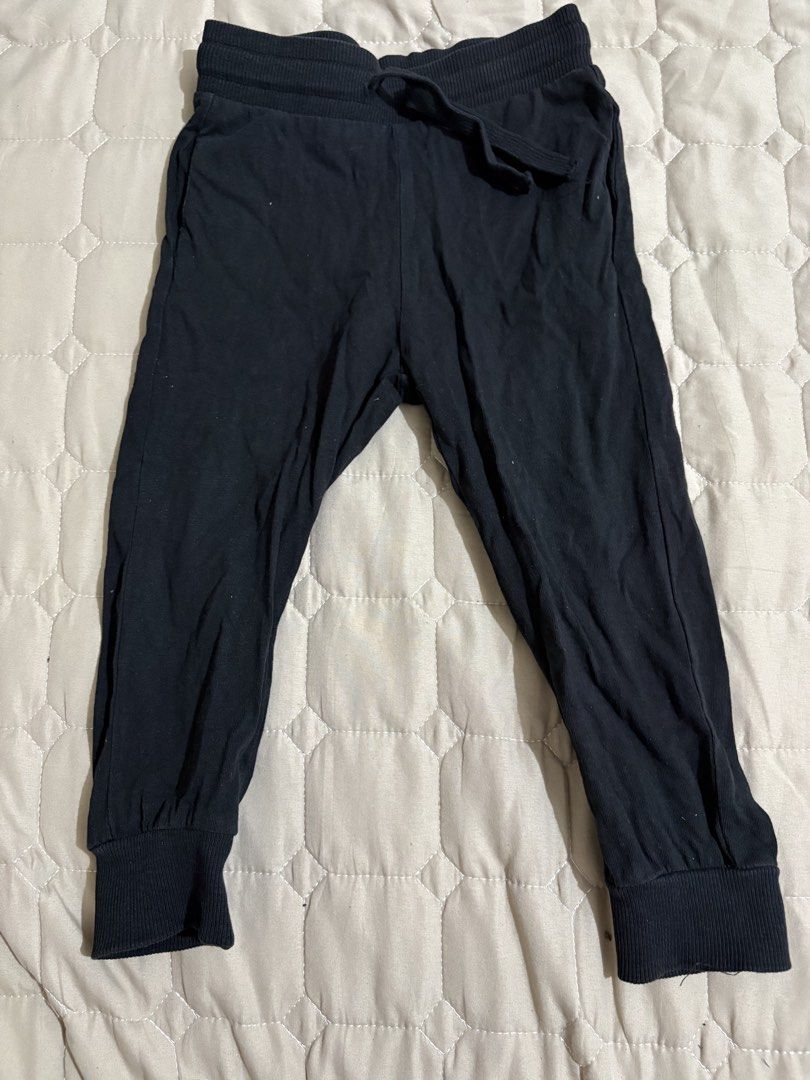 H&M Black Joggers Pants Size 2T (Category: Babies & Kids Fashion) located in Pasig City. Submitted by vhasibuan (Listing ID 1465887824, Image 1). Description: - Brand: H&M - Item: Toddler Joggers - Color: Black - Size: US 2T / EUR 92 - Material: Soft and comfortable cotton - Features: Elastic waistband with adjustable drawstring and ribbed ankle cuffs - Origin: Made in Bangladesh - Condition: Great for everyday wear!.