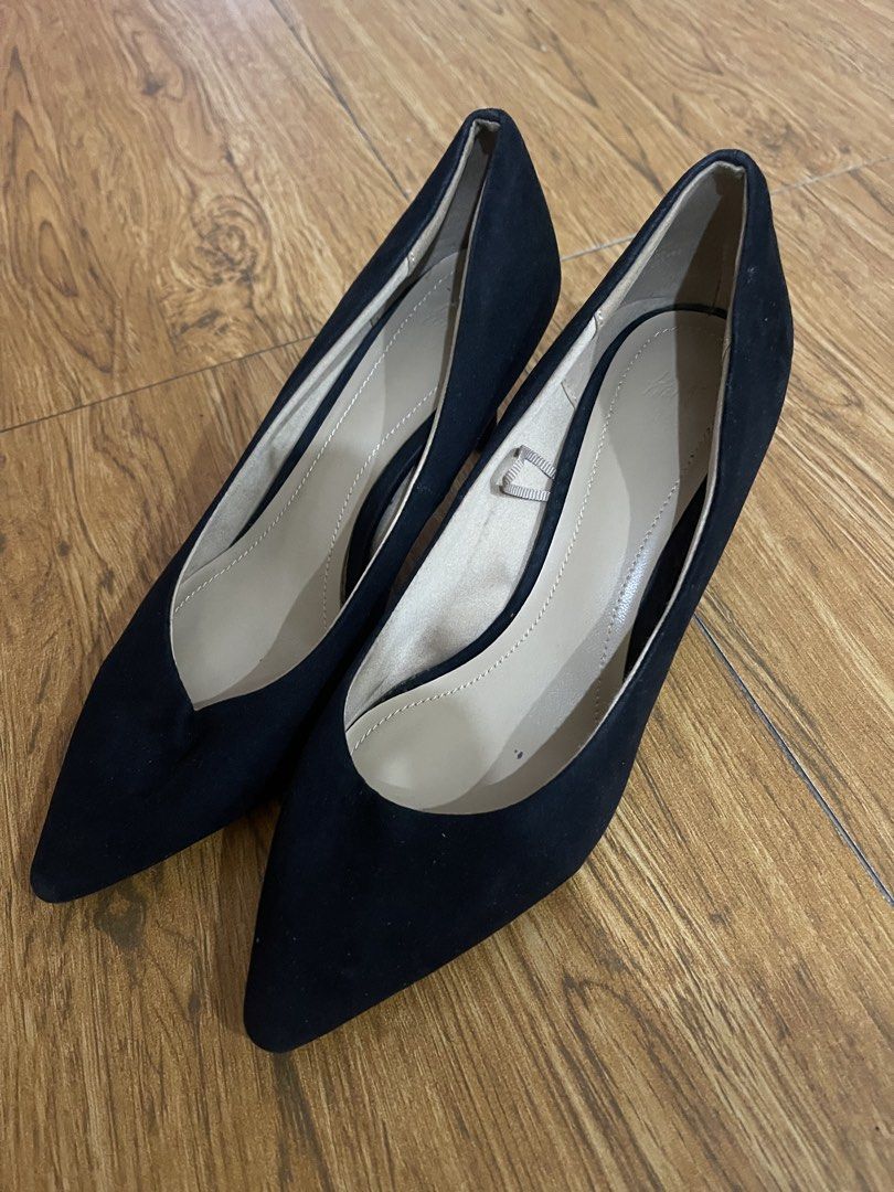 H&M Black Suede Pointed Toe Heels Size 36 (Category: Heels) located in Manila. Submitted by ghem24 (Listing ID 1465888288, Image 1). Description: - Brand/Style: H&M black pointed toe heels - Size: 36 (stamped on insole) - Material/Design: Suede-like exterior, classic slip-on, beige inner lining - Condition: Previously worn, clean soles, plenty of life left - Versatility: Great basic pair for work or going out.