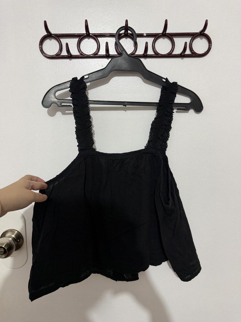 H&M Divided Black Camisole Top Size L (Category: Sleeveless) located in Las Pinas. Submitted by milkydeclutter (Listing ID 1465938120, Image 3). Description: - Brand: H&M Divided - Size: Large - Color: Black - Details: Button-down front, textured center panel, square neckline, and ruffled lace straps - Material: Lightweight fabric, ideal for warm weather or layering - Condition: Good overall.