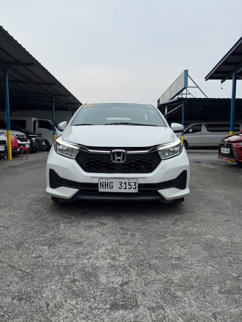 Honda Brio (Category: Used Cars) located in Quezon City. Submitted by jayjet.jayjet (Listing ID 1465830850, Image 2). Description: 2023 HONDA BRIO V Automatic Transmission 1st Owned Unit 25tkm Airbags 2 remote keys No Issues No Accidents All Power All Original Fresh In and Out Mechanic Inspected Complete Tools, Jack and Spare Tire Price P 518k Financing/Trade-in Accepted Sample Financing Computations Down P100k all in P14k+ 4yrs P18k+ 3yrs Down P