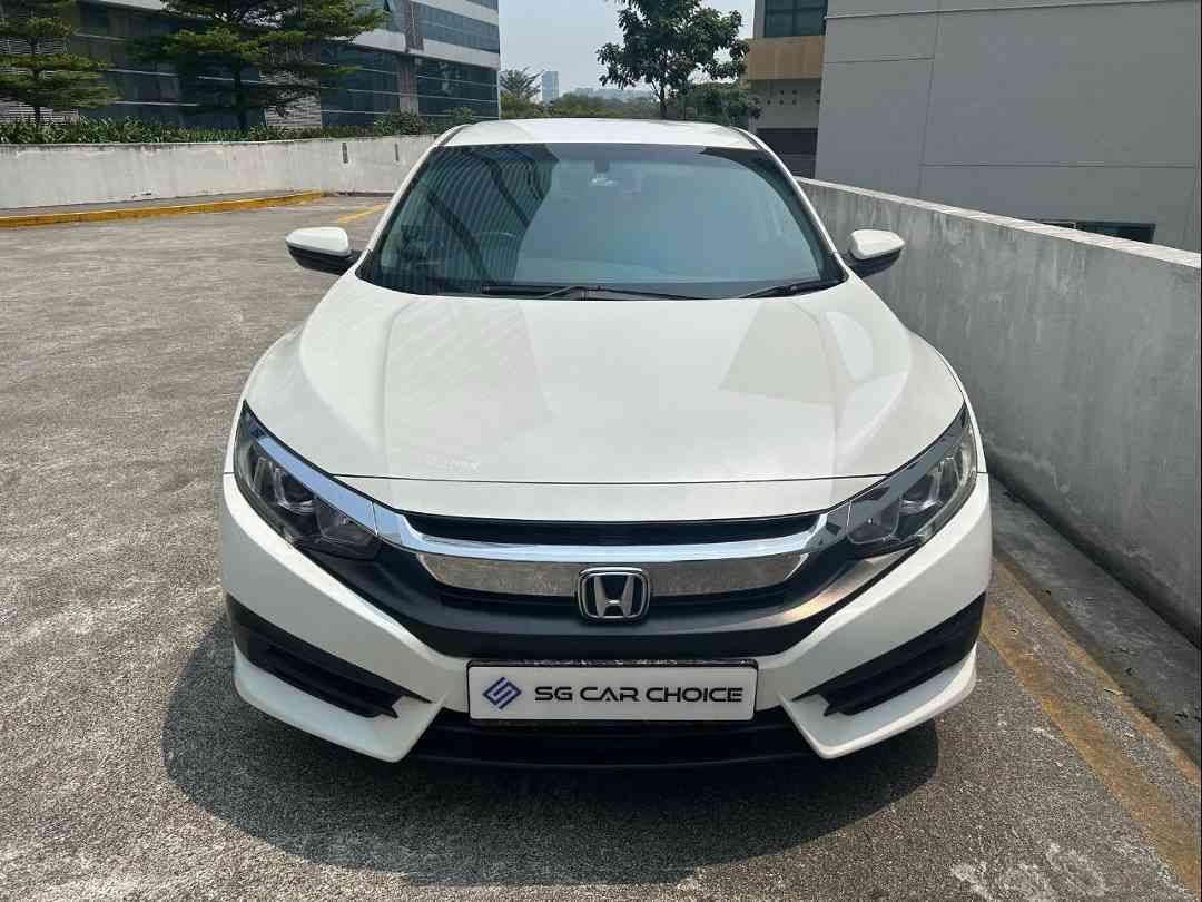 Honda Civic 1.6 i-VTEC (A) (Category: Used Cars) located in Singapore. Submitted by sgcarchoicewc (Listing ID 1465843955, Image 1). Description: Low average mileage done. Superb interior condition. Go for quality, assurance and peace of mind with this beautiful unit. Responsive sporty drive feel. Spacious cabin leg room. One of the most reliable Japanese made sedan in the market. New paint work will be provided to the next owner. Dont miss it! Co