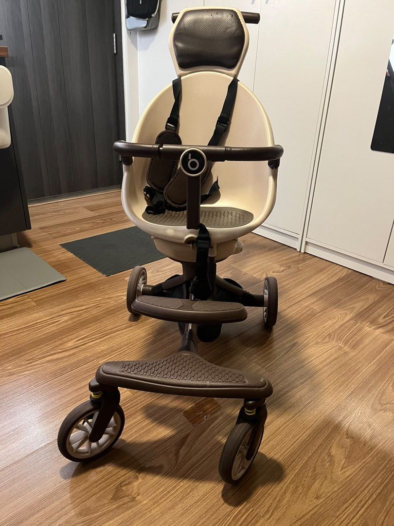 Hooboo baby stroller (Category: Strollers) located in Makati City. Submitted by natsukishan (Listing ID 1465864229, Image 2). Description: - Brand: Hooboo Convertible Stroller - Color: Stylish beige and brown - Safety First: Equipped with a padded seat harness - Comfort: Includes fold-down footrests at the front, wheels with absorber- nice to stroll on the street too! - Space-Saving: Compact fold mechanism for easy car trunk or apartment storage 