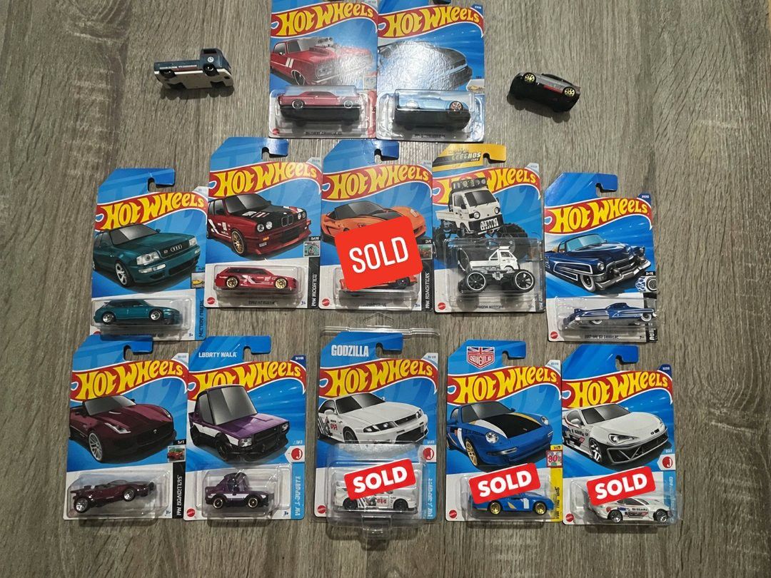 Hot wheels 100 pag take all (Category: Vehicle & Diecast Models) located in Las Pinas. Submitted by brokebouz (Listing ID 1465883601, Image 1). Description: - Hot Wheels die-cast metal vehicles for collectors and kids - Variety includes carded mainlines, multi-packs, and a few loose cars - Features popular models like Audi wagon, Nissan Skyline Godzilla edition, Jaguar, and Toyota AE86 - Note: Several cards shown in the photo are already sold, re