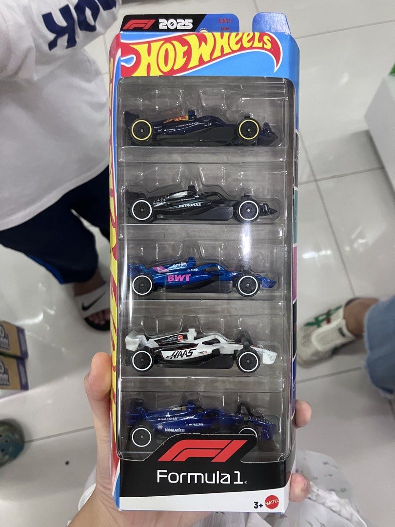 Hot Wheels Formula 1 2025 5-Car Pack (Category: Vehicle & Diecast Models) located in Manila. Submitted by vastflower.67 (Listing ID 1465870457, Image 1). Description: - Brand new Hot Wheels Formula 1 2025 5-car set - Includes Red Bull, Mercedes, Alpine, Haas, and Williams liveries - Unopened blister pack in original box - Features official F1 branding and Mattel logo - Ideal for motorsport fans and collectors.