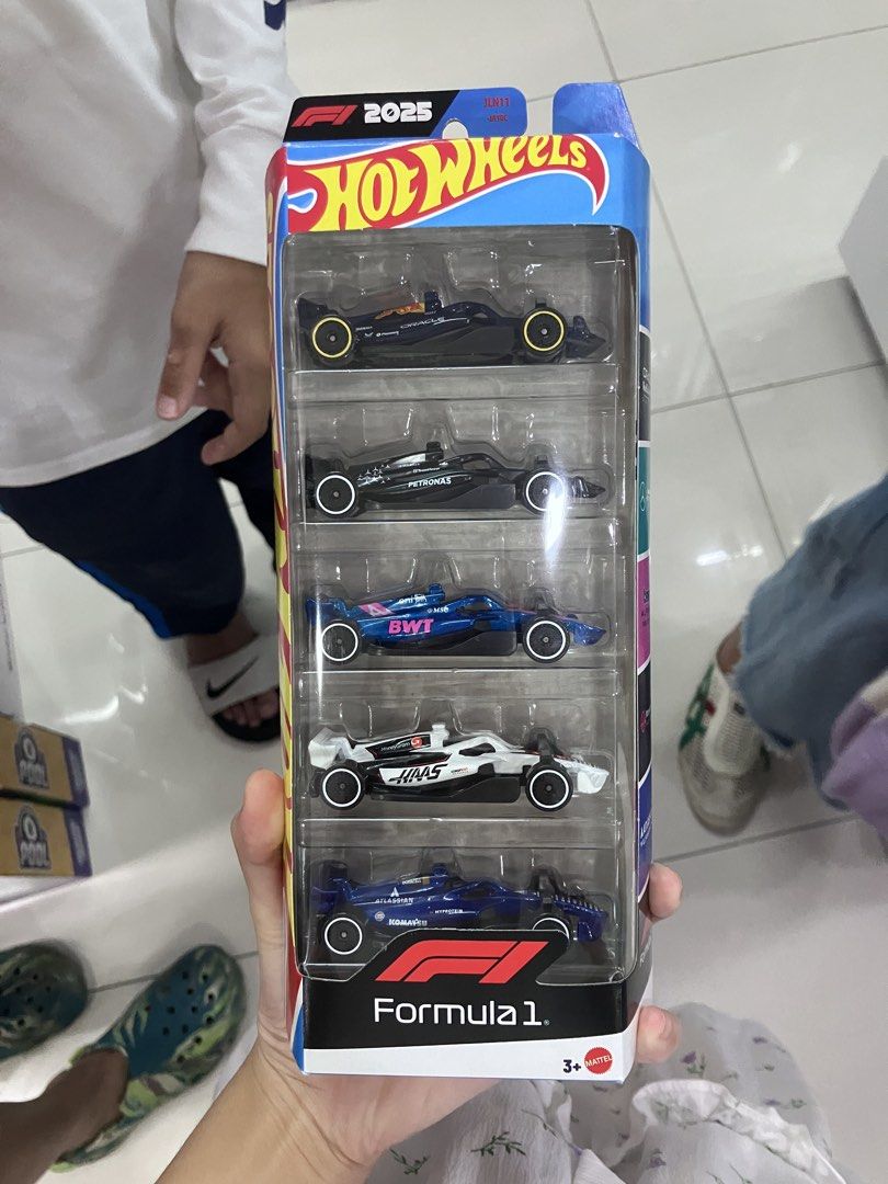 Hot Wheels Formula 1 2025 5-Car Pack (Category: Vehicle & Diecast Models) located in Manila. Submitted by vastflower.67 (Listing ID 1465870457, Image 2). Description: - Brand new Hot Wheels Formula 1 2025 5-car set - Includes Red Bull, Mercedes, Alpine, Haas, and Williams liveries - Unopened blister pack in original box - Features official F1 branding and Mattel logo - Ideal for motorsport fans and collectors.