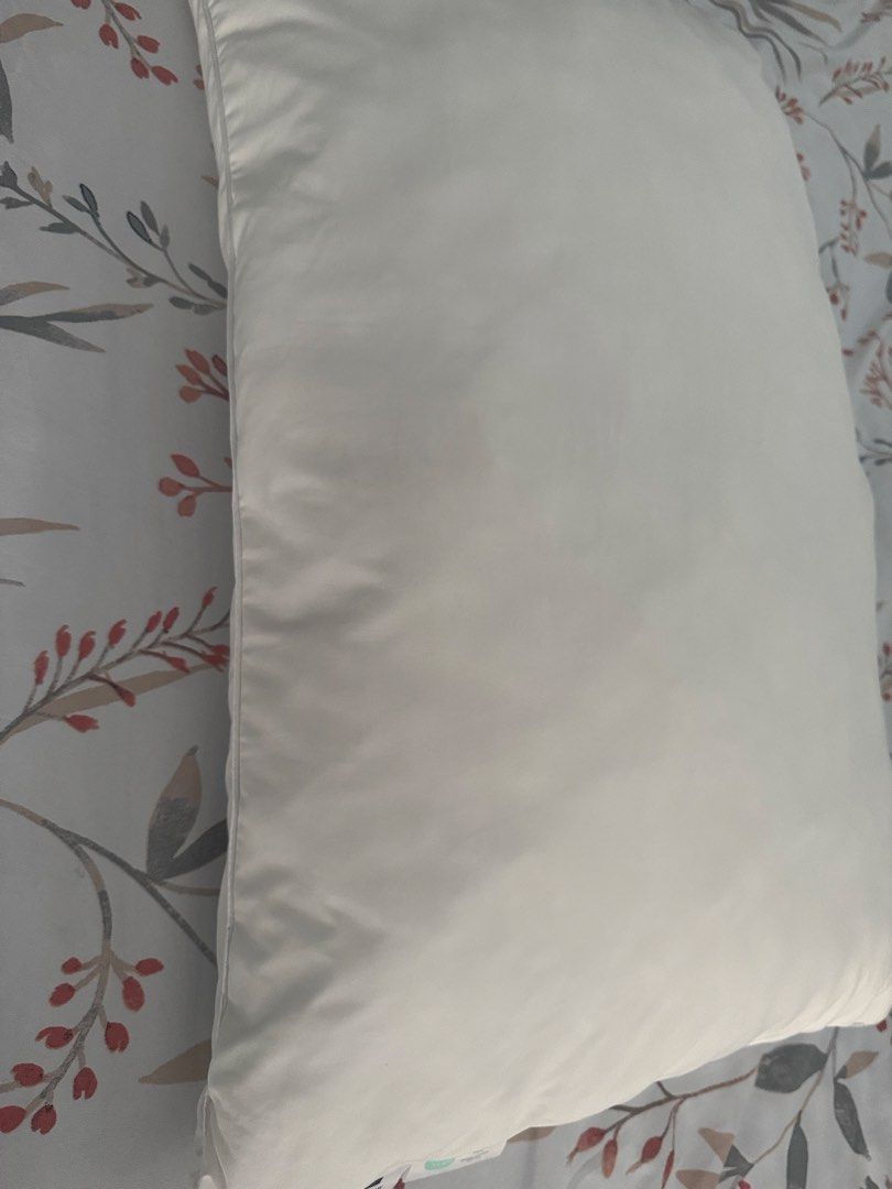 Hotel Living Microlux Pillow with Memory Foam (Category: Bedding & Towels) located in Manila. Submitted by decluterthings888 (Listing ID 1465953343, Image 3). Description: - Brand: Hotel Living Microlux Pillow - Filling: Memory foam inside for superior support - Certification: Standard 100 OEKO-TEX certified materials - Size: Standard 19" x 29" (48 x 74 cm) - Design: Clean white color with stylish piping edges - Feel: Plush, comfortable, and grea