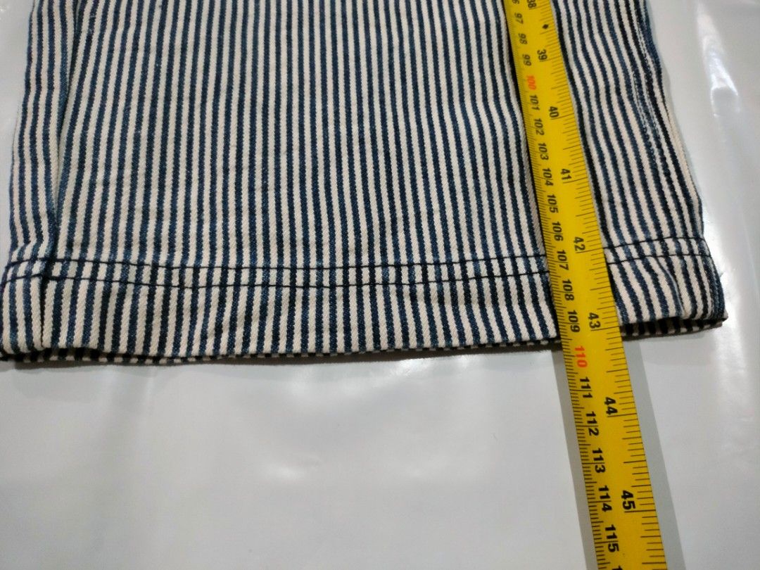 Houston White Hickory Stripe Carpenter Pants (Category: Jeans) located in Abucay. Submitted by naixrazion199x (Listing ID 1465838900, Image 3). Description: - Brand: Houston White - Style: Carpenter pants in classic blue & white hickory stripe - Size: Tagged 38x34 (Brand new with original paper tags) - Fit: Straight leg, heavy-duty cotton material - Features: Utility pockets and functional hammer loop - Measurements: ~18 inches across the waist, 