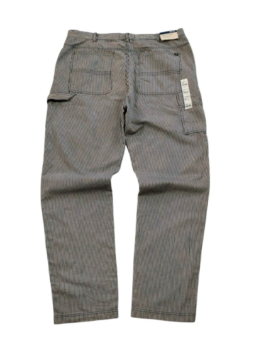 Houston White Hickory Stripe Carpenter Pants (Category: Jeans) located in Abucay. Submitted by naixrazion199x (Listing ID 1465838900, Image 1). Description: - Brand: Houston White - Style: Carpenter pants in classic blue & white hickory stripe - Size: Tagged 38x34 (Brand new with original paper tags) - Fit: Straight leg, heavy-duty cotton material - Features: Utility pockets and functional hammer loop - Measurements: ~18 inches across the waist, 