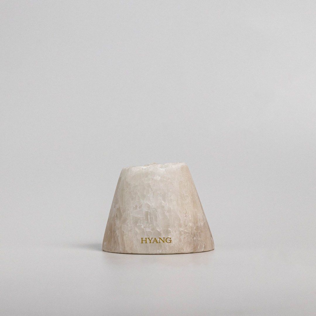 HYANG Diffusing Stone (Category: Home Fragrance) located in Singapore. Submitted by pigsnout (Listing ID 1465780744, Image 3). Description: - Brand new (without box) - The stone is soft and naturally porous with tiny pores and spaces within, making it a great carrier to absorb and encapsulate essential oils within itself - Add essential oil directly to stone https://hyang.co/collections/diffusers/products/vulcan-diffusing-stone.