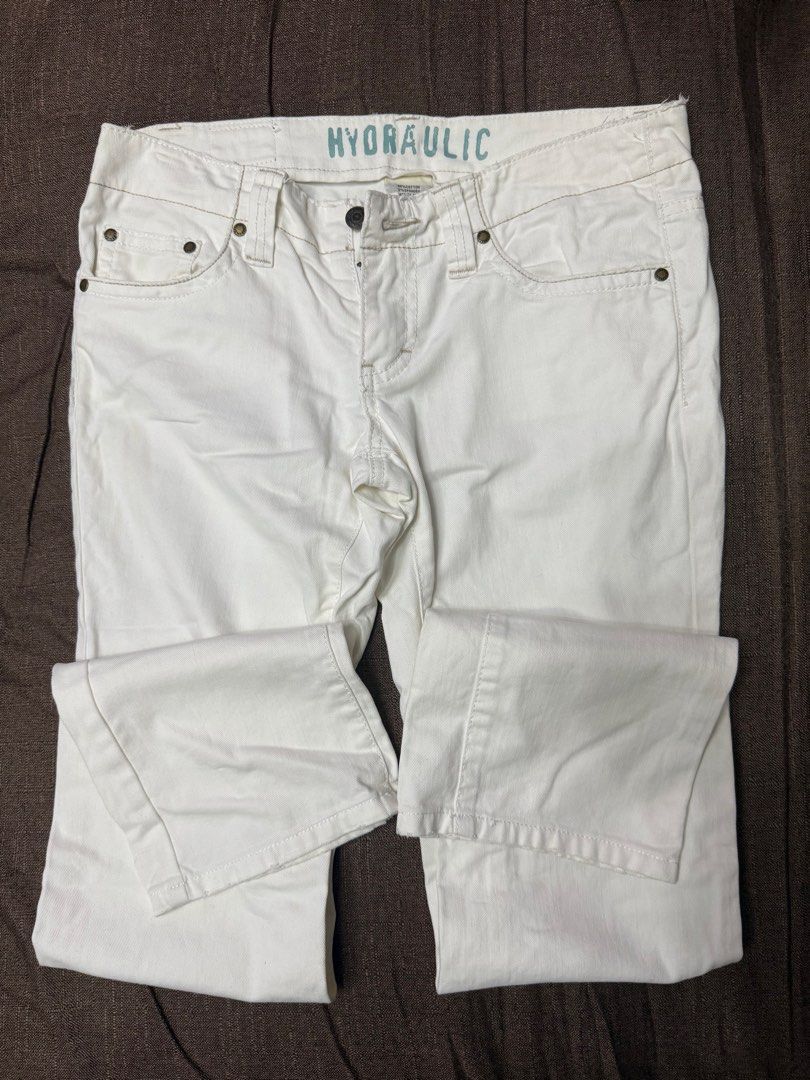 Hydraulic White Jeans (Category: Jeans) located in Quezon City. Submitted by mt031199 (Listing ID 1465947459, Image 2). Description: - Brand: Hydraulic - Color: White denim - Style: Classic five-pocket design with button fly closure - Details: Contrast stitching and branded interior waistband print - Fit/Use: Great staple piece for effortless casual outfits.