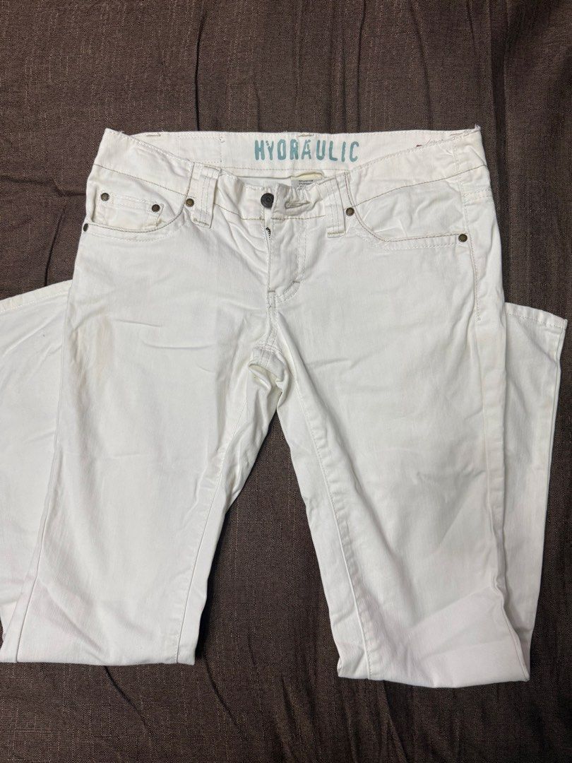 Hydraulic White Jeans (Category: Jeans) located in Quezon City. Submitted by mt031199 (Listing ID 1465947459, Image 1). Description: - Brand: Hydraulic - Color: White denim - Style: Classic five-pocket design with button fly closure - Details: Contrast stitching and branded interior waistband print - Fit/Use: Great staple piece for effortless casual outfits.