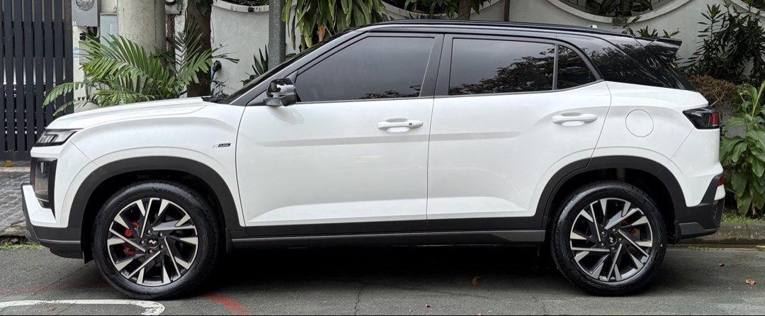 Hyundai Creta N-Line Auto (Category: Used Cars) located in Makati City. Submitted by ale828 (Listing ID 1465876330, Image 1). Description: 2025 Hyundai Creta N-Line Top of the line Mileage: 1,200km+ Color: White All Stock- some stickers and plastics are intact 1.5L turbo engine Automatic with paddle shifter Leather seats with ventilation Apple car play/android auto ADAS Complete. 2 keys and manuals Recently done 1tkm PMS at Hyundai Casa Price: 1.