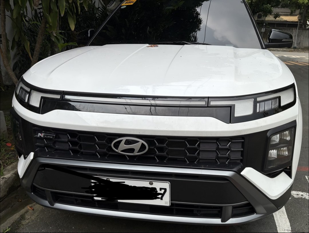 Hyundai Creta N-Line Auto (Category: Used Cars) located in Makati City. Submitted by ale828 (Listing ID 1465876330, Image 2). Description: 2025 Hyundai Creta N-Line Top of the line Mileage: 1,200km+ Color: White All Stock- some stickers and plastics are intact 1.5L turbo engine Automatic with paddle shifter Leather seats with ventilation Apple car play/android auto ADAS Complete. 2 keys and manuals Recently done 1tkm PMS at Hyundai Casa Price: 1.
