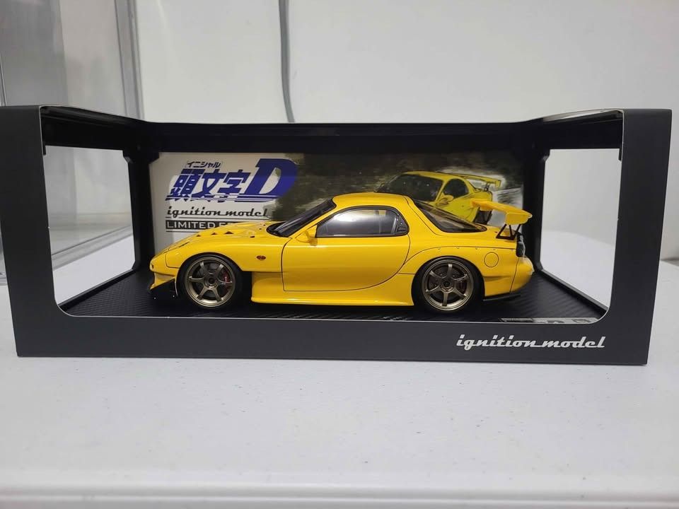 Ignition Model Initial D Mazda RX-7 FD3S 1:18 Yellow (Category: Vehicle & Diecast Models) located in Pasig City. Submitted by hobbystuff07 (Listing ID 1465821152, Image 2). Description: Displayed in acrylic box Dirty card board banner back Meetups only at megamall, robinsons galleria, opus mall, sm east ortigas, greenhills.
