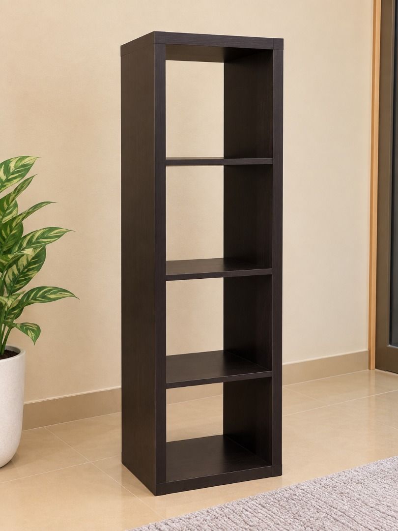 IKEA KALLAX 4-cube shelf unit dark brown (Category: Shelves, Cabinets & Racks) located in Caloocan City. Submitted by adeleherm31301 (Listing ID 1465847143, Image 2). Description: - Dark brown wood finish with clean, minimalist lines - Versatile design: works horizontally as a TV console or bookshelf - Sturdy construction featuring open compartments on both sides - Compatible with standard storage boxes - Shows minor signs of normal use - Ready f
