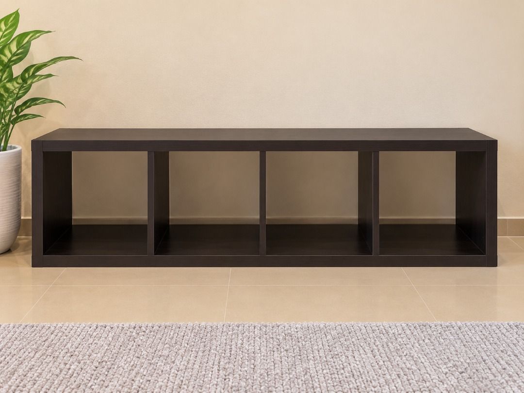 IKEA KALLAX 4-cube shelf unit dark brown (Category: Shelves, Cabinets & Racks) located in Caloocan City. Submitted by adeleherm31301 (Listing ID 1465847143, Image 1). Description: - Dark brown wood finish with clean, minimalist lines - Versatile design: works horizontally as a TV console or bookshelf - Sturdy construction featuring open compartments on both sides - Compatible with standard storage boxes - Shows minor signs of normal use - Ready f