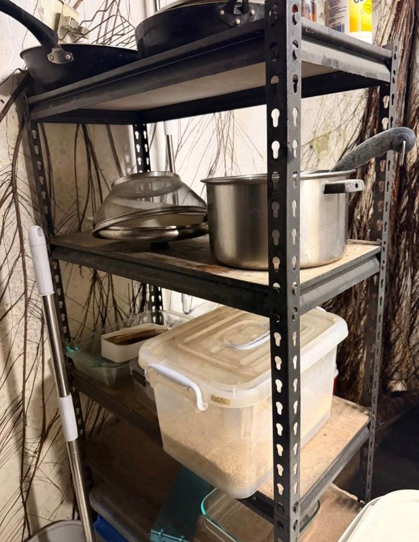Industrial Style Metal Storage Shelving Unit Kitchen Rack (Category: Shelves, Cabinets & Racks) located in Caloocan City. Submitted by vic2489 (Listing ID 1465789886, Image 1). Description: - Type: Heavy-duty utility rack / shelving unit - Material: Black metal frame with 4 sturdy wooden shelves - Versatile: Ideal for garage, kitchen, or storage room organization - Design: Open shelving style, great for pots, pans, and storage containers - Featur