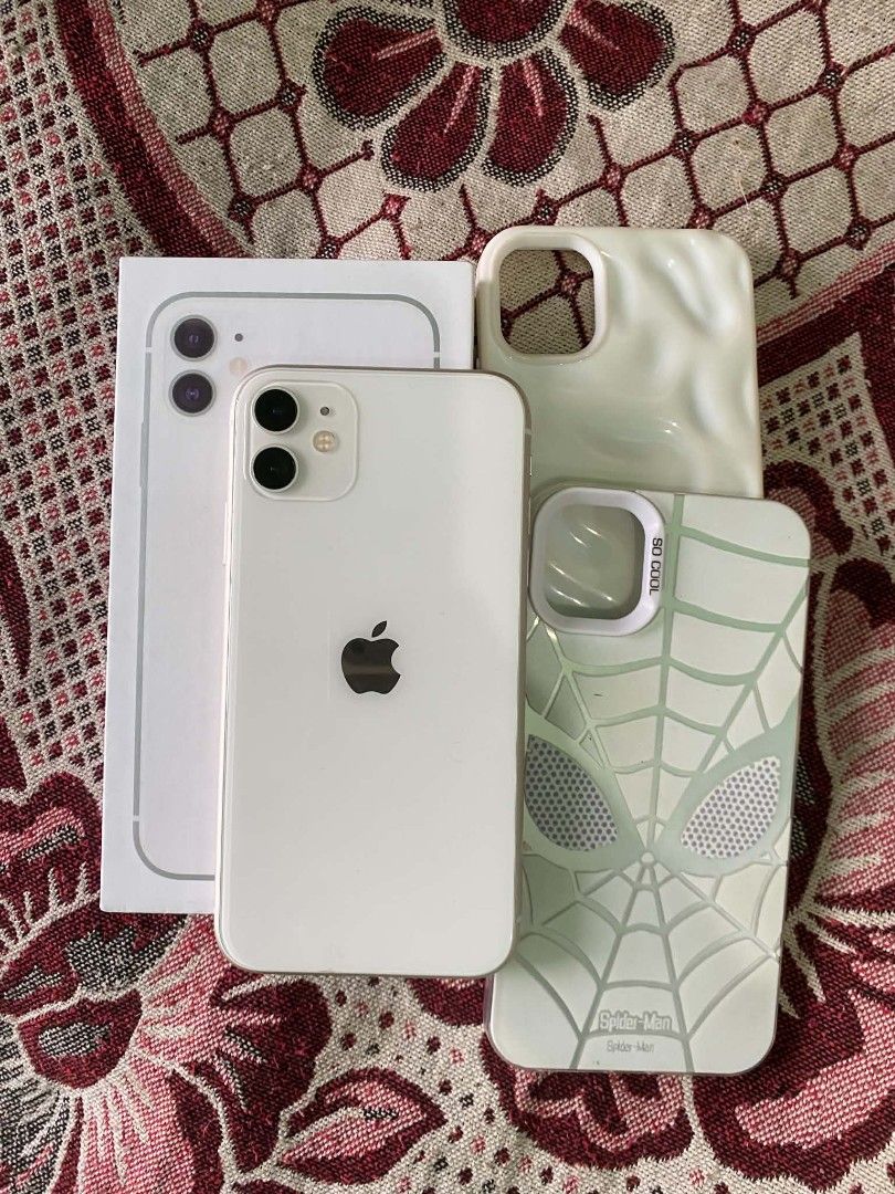 iphone 11 256Gb (Category: iPhone 11 Series) located in Manila. Submitted by loydlim123 (Listing ID 1465871574, Image 2). Description: FOR SALE IPHONE 11 (WHITE) - (256 GB) - ios 26.1 - No Sim restrictions - Genuine Camera - 97% battery health (orig batt pa) - Face id Working -Malinaw front & back camera - True Tone -Ready for use na -Auto check -makinis pa -smooth -no hard touch - WITH CHARGER AND 2CASES/ BOX ISSUE NO RESET.