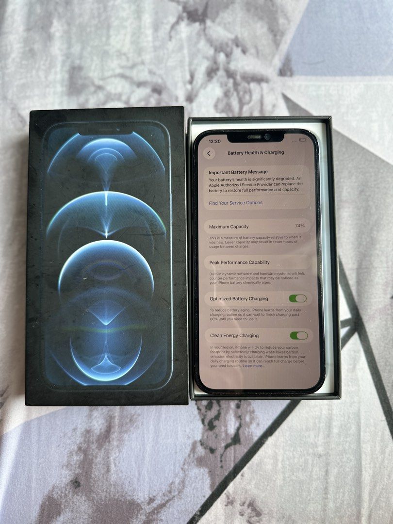 IPHONE 12 PRO MAX 256gb (Category: iPhone 12 Series) located in Quezon City. Submitted by arkivin13 (Listing ID 1465801771, Image 3). Description: Model: Iphone 12 Pro Max Storage: 256gb Battery Health: 74% Other details: - Minimal (very small) scratch upper right corner - Truetone and Face ID working perfectly - With privacy screen protector already installed - Original Box included with pin for sim card only. Charger cable not included - No rep