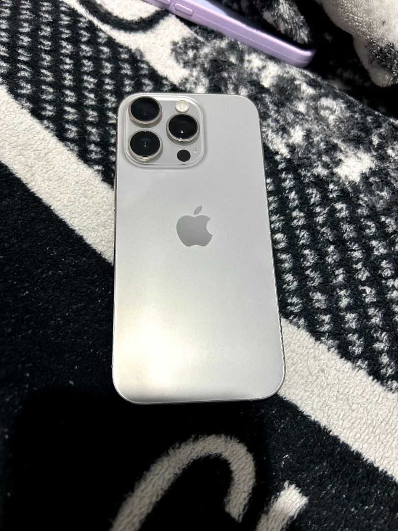 iPhone 15 Pro 128GB Natural Titanium (Category: iPhone 15 Series) located in Lian. Submitted by itsdvnnnnn (Listing ID 1465777577, Image 1). Description: No any issue, all working and no history of repair. Can be updated and reset No paint chips or whatsoever No more box just the case and original charger Not for buy and sell wag na maghanap ng wala Again, the price is fair enough since hindi na complete But the phone is 100% good as new Location
