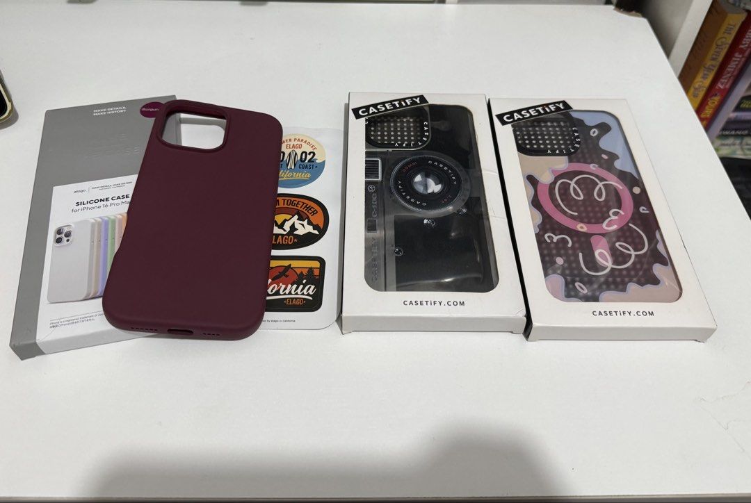 Iphone 16 pro max Case - set (Category: Cases & Sleeves) located in Manila. Submitted by ririjeon (Listing ID 1465887768, Image 1). Description: Elago Case - Burgundy Casetify.