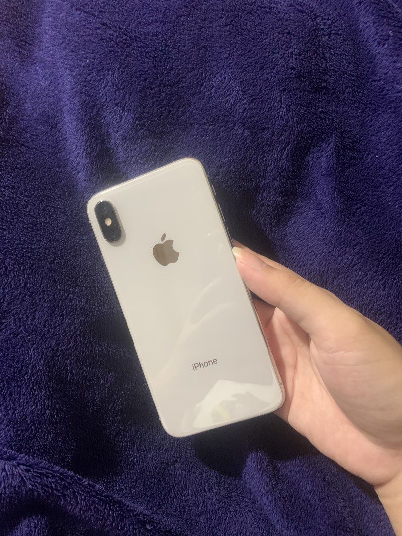 iphone X silver (Category: iPhone X Series) located in Pasay City. Submitted by royalearth.c1dd07 (Listing ID 1465774233, Image 1). Description: RUSH FOR SALE!! iphone X silver 64 gb ₱5,250 can let go for ₱5,000 RFS: badly need funds condition: - face id working, camera working - no scratch sa back glass mismo - lcd replaced but true tone still works - lower button naka-dent na or hindi na naka-angat - unli icloud reset other than that, all worki