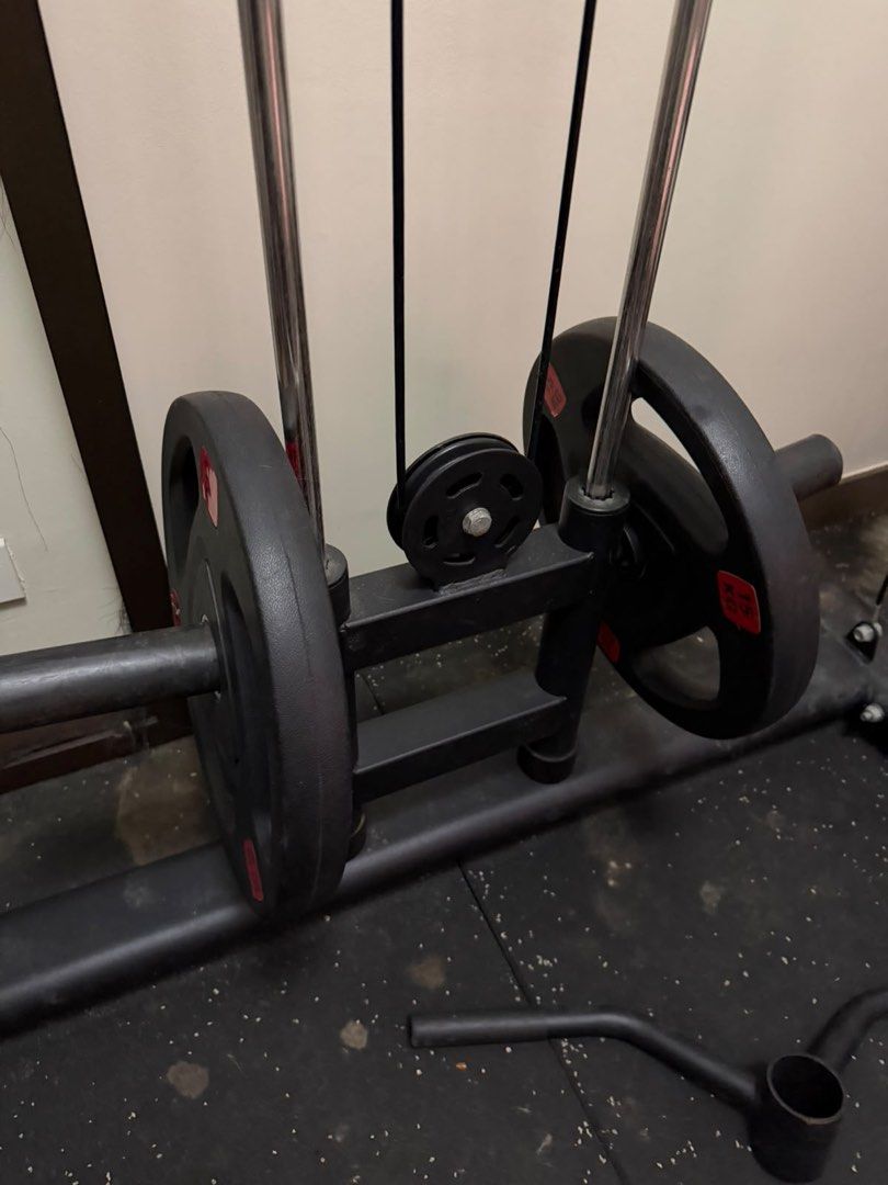 Ironclad IC9000 Powercage (Category: Weights & Dumbbells) located in Manila. Submitted by jonkakkee (Listing ID 1465847142, Image 2). Description: Dimensions: 220 × 170 × 145 cm (cage dimension) meanwhile the heavy duty floor mat is 85inch x 85inch. * IRONCLAD IC9000 Power Cage * ⁠Adjustable bench * Dual adjustable cable/pulley system * Multi-grip pull-up/chin-up handles * J-hooks / bar supports * Dip attachments * Plate-storage pegs * Olympic-ba